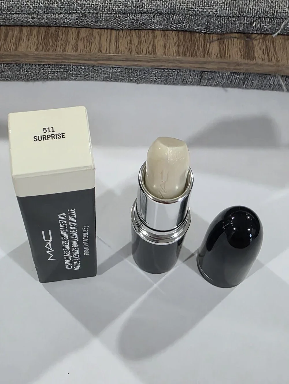 MAC Lustreglass Sheer-Shine Lpstick Surprise/Clear with champagne gold Pearl.